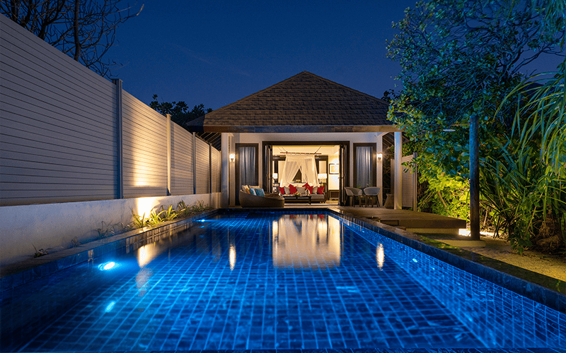 atmosphere kanifushi maldives kanifushi beach villa with pool exterior view front sunset 1 v2