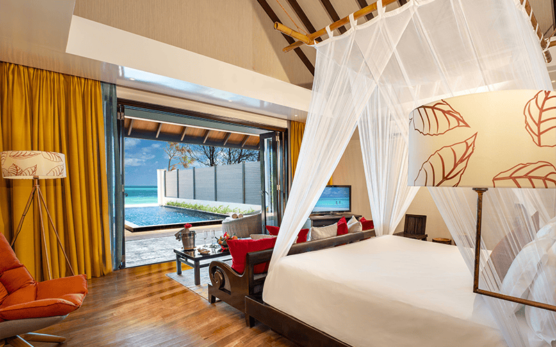 atmosphere kanifushi maldives kanifushi beach villa with pool view from bedroom v2