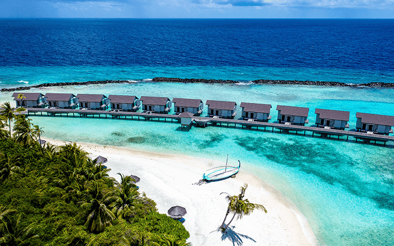 atmosphere kanifushi maldives water villa aerial 05 09 2023 v2