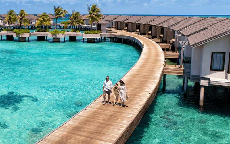 atmosphere kanifushi maldives water villas jetty lifestyle 12 2024 2 v2