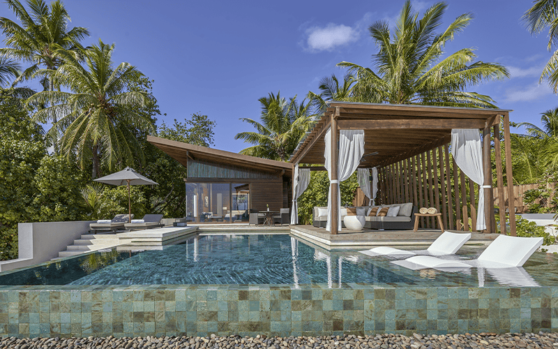 deluxe beach pool villa exterior compressed