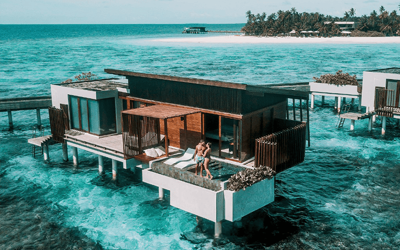 mldph p347 overwater sunset pool villa couple compressed