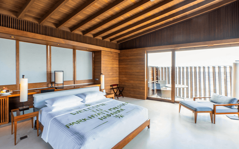 overwater villa bedroom compressed