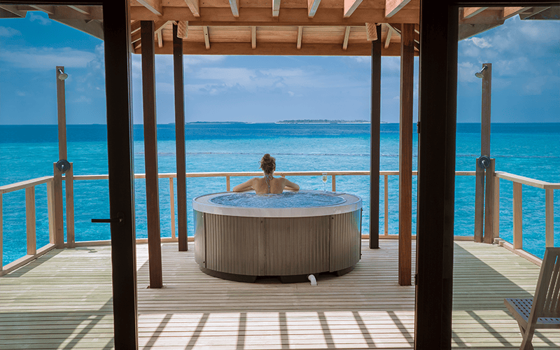 8 . two bedroom water villa suite with spa tub (2) compressed