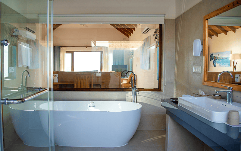 8 . two bedroom water villa suite with spa tub (5) compressed