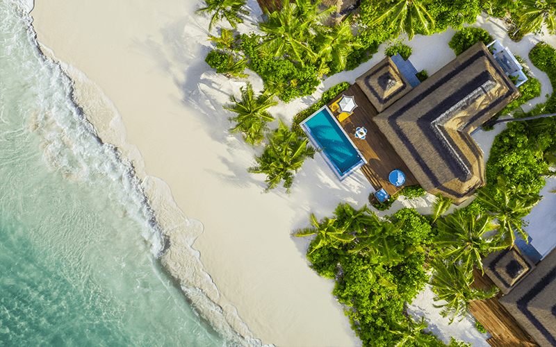 family beach pool aerial compressed