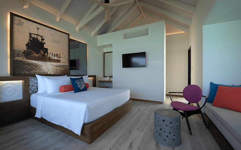 oblu xperience ailafushi water villa bedroom compressed