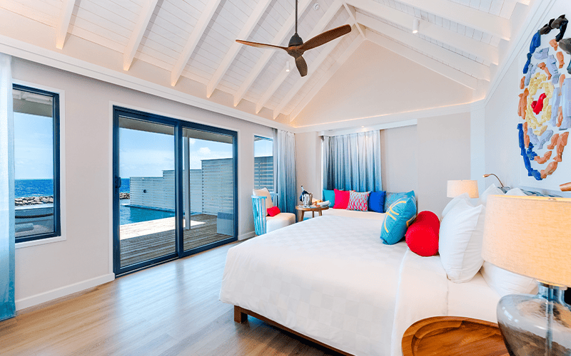 onhs honeymoon sunset water villa with pool bedroom interior 2 compressed