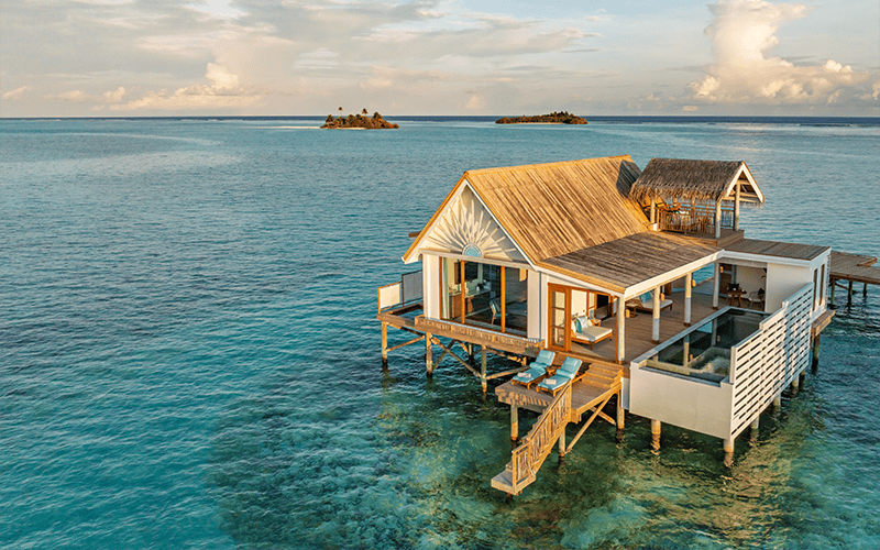 rah gili maldives water pool villa with slide aerial v2