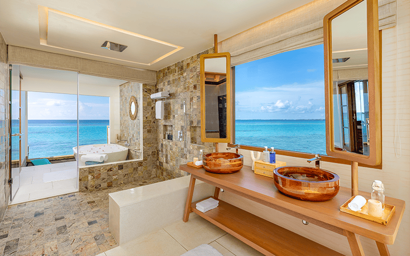 rah gili maldives water pool villa with slide bathroom v2