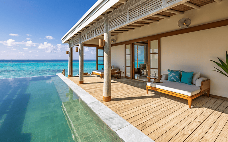 rah gili maldives water pool villa with slide outdoor deck v2