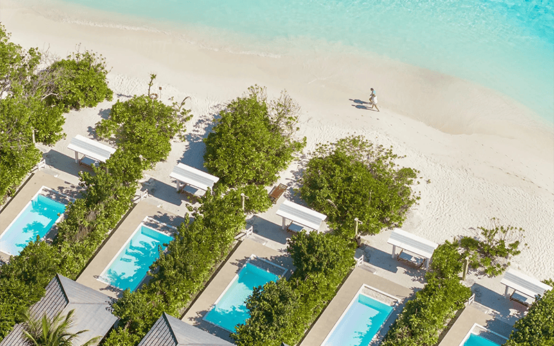 royal island beach pool villa aerial angle view 4k compressed