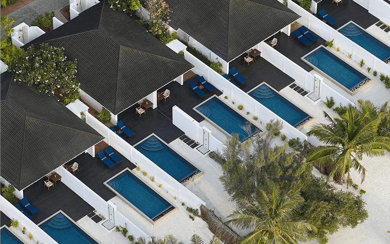 villa nautica sunset deluxe beach pool villa poolside aerial 4 large v2