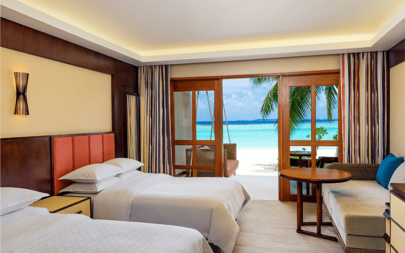shemlesigr 196076 beach front deluxe room bedroom high 01 v2