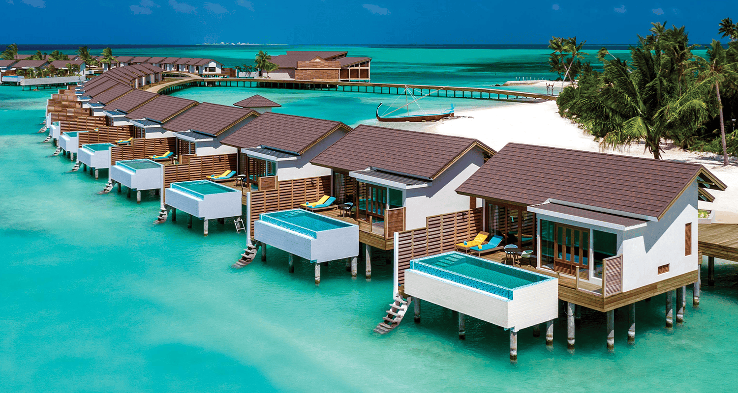 atmosphere kanifushi maldives aerial view water villa jetty 03 v2