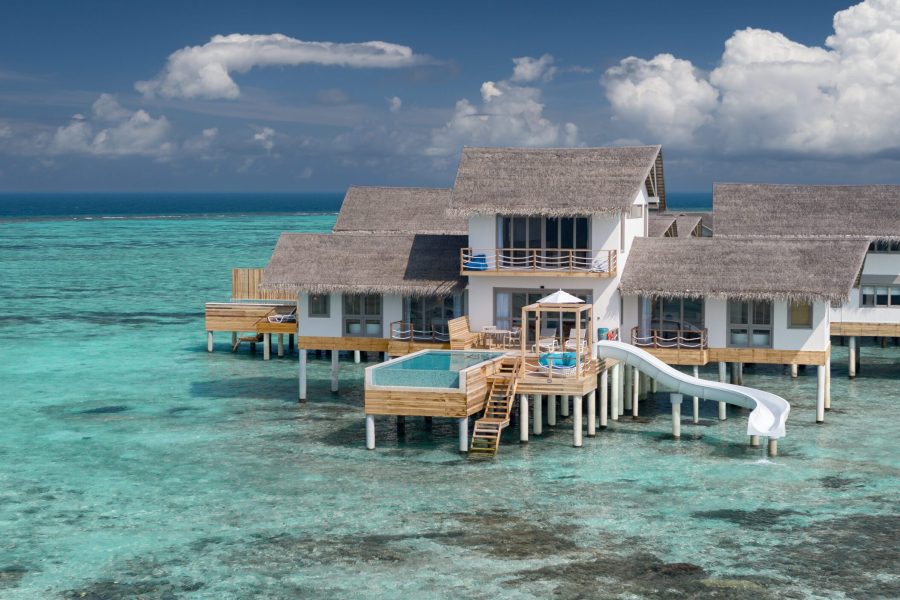 ccm two bedroom lagoon pool villa with slide drone shot v2