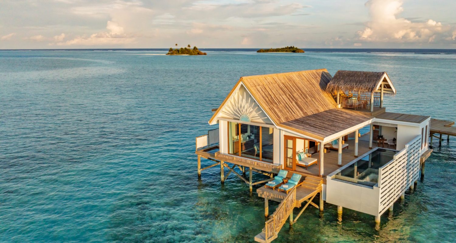 rah gili maldives water pool villa with slide aerial v2